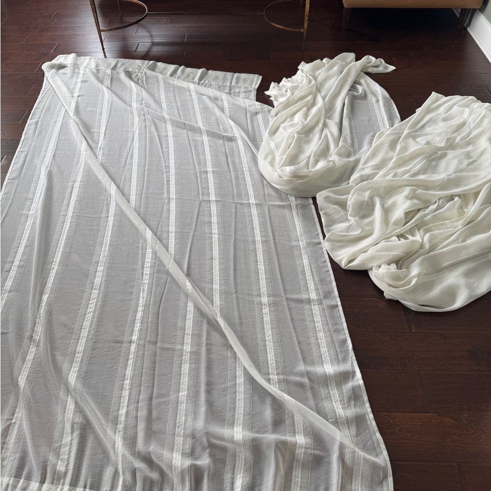FOUR PANELS of 52 x 90 inches semi sheer curtains